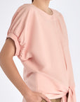 Side profile of the Rose Shelby Blouse, highlighting the soft drape of the premium linen blend.