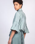 Sierra silk blouse in dark green with a sleek collar and balloon sleeves