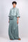 Sierra silk blouse in dark green with a sleek collar and balloon sleeves