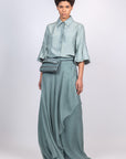 Sierra silk blouse in dark green with a sleek collar and balloon sleeves