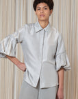 Sierra silk blouse in silver with balloon sleeves and hidden buttons