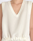 Detailed shot of the delicate hemstitch embroidery on the armhole of the Off White Valencia Blouse.