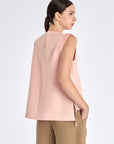 Clean back silhouette of the Valencia Blouse, showing the elegant drape of the fabric.