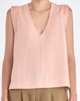 Front view of the Valencia Blouse in a delicate Rose hue, showcasing its premium linen blend fabric.
