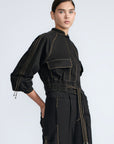 Zoe Jacket in Black – 100% cotton jacket with flap patch pockets, hidden buttons, long sleeves, and an adjustable drawstring hem.