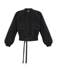 Zoe Jacket in Black – 100% cotton jacket with flap patch pockets, hidden buttons, long sleeves, and an adjustable drawstring hem.