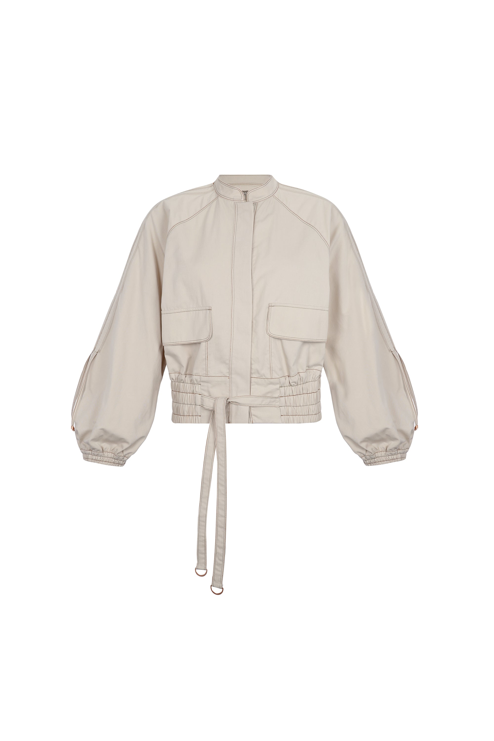 Zoe Jacket in Prestine – 100% cotton jacket with flap patch pockets, hidden buttons, long sleeves, and an adjustable drawstring hem.