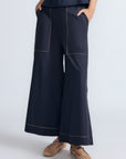 Zoe Pant in Navy – Wide-leg cotton pants with front and back patch pockets, high waist, and contrast stitching.