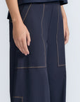 Zoe Pant in Navy – Wide-leg cotton pants with front and back patch pockets, high waist, and contrast stitching.