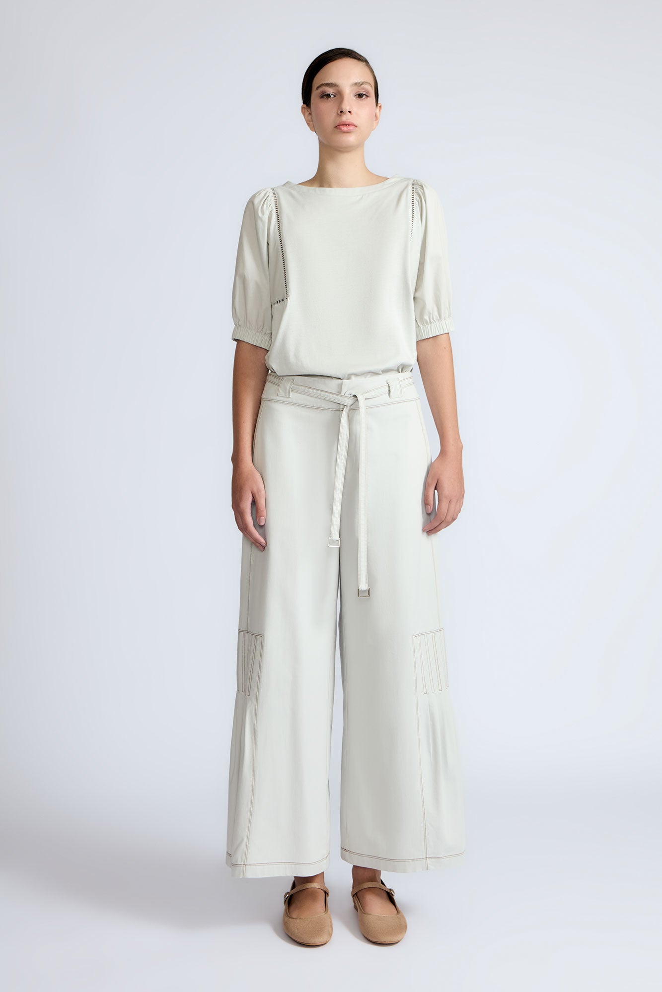 Zoila Pant in Silver – High-waisted cotton palazzo pants with metal buckle belt, back patch pockets, and contrast stitching.