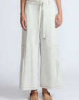 Zoila Pant in Silver – High-waisted cotton palazzo pants with metal buckle belt, back patch pockets, and contrast stitching.
