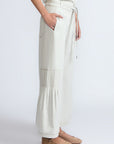 Zoila Pant in Silver – High-waisted cotton palazzo pants with metal buckle belt, back patch pockets, and contrast stitching.