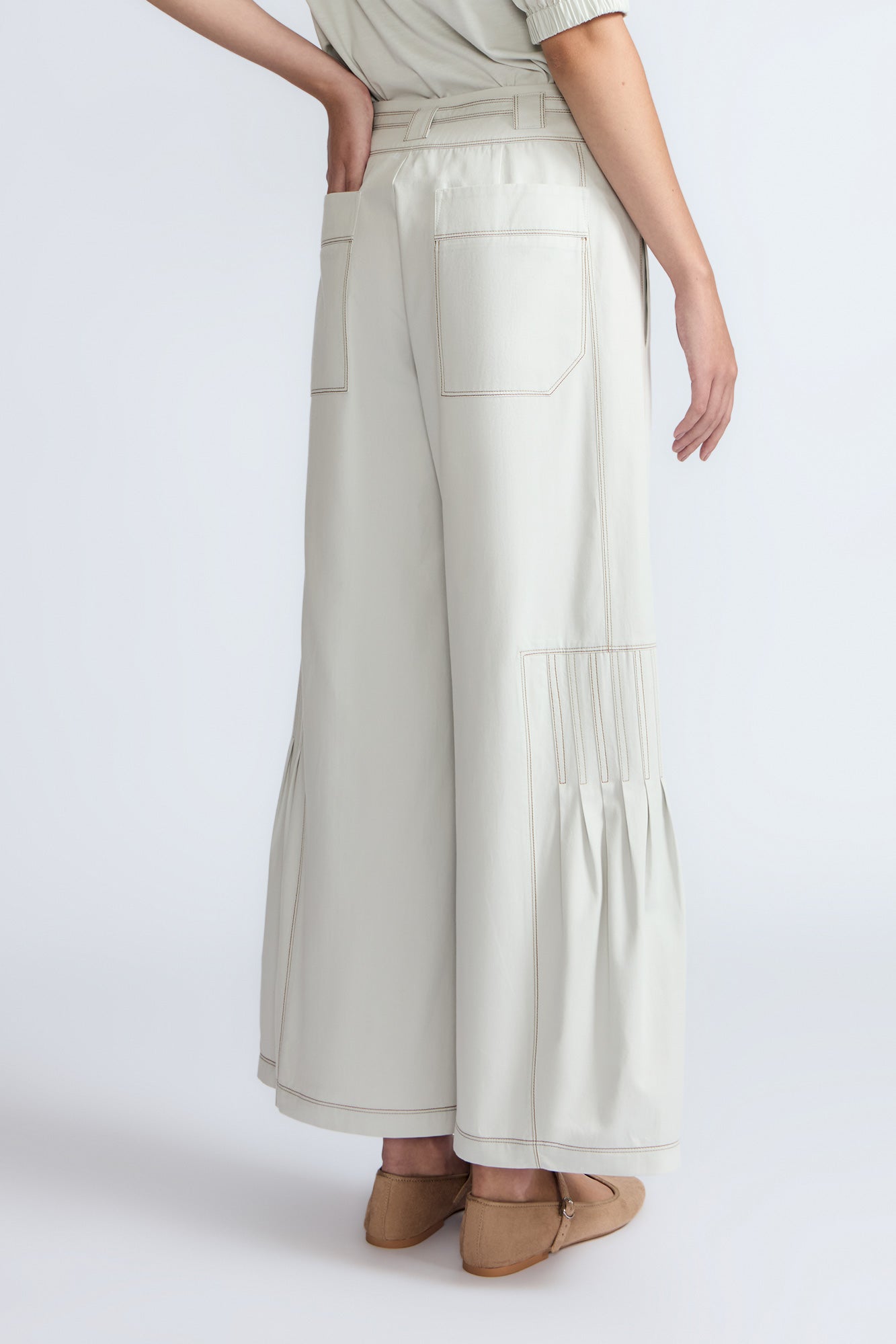 Zoila Pant in Silver – High-waisted cotton palazzo pants with metal buckle belt, back patch pockets, and contrast stitching.