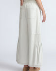 Zoila Pant in Silver – High-waisted cotton palazzo pants with metal buckle belt, back patch pockets, and contrast stitching.