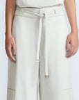Zoila Pant in Silver – High-waisted cotton palazzo pants with metal buckle belt, back patch pockets, and contrast stitching.