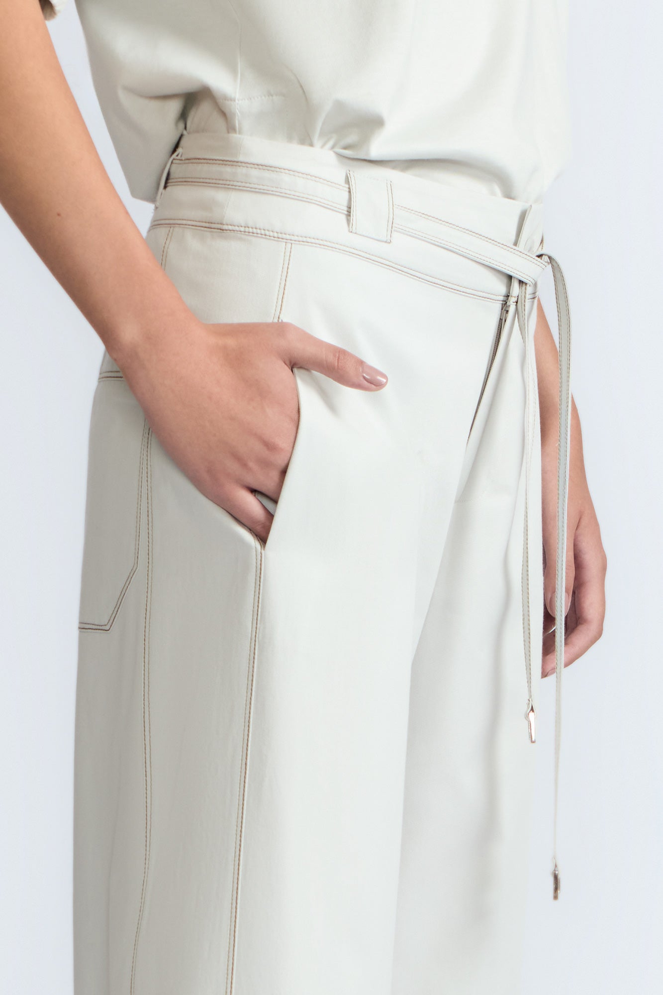 Zoila Pant in Silver – High-waisted cotton palazzo pants with metal buckle belt, back patch pockets, and contrast stitching.