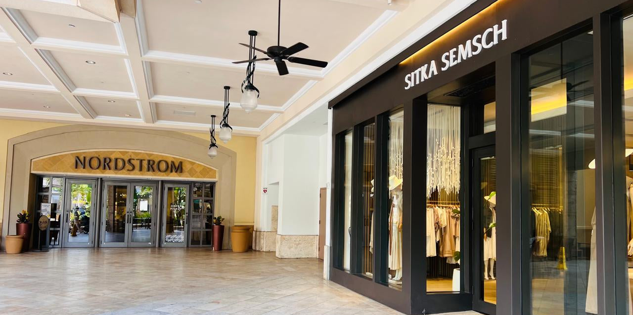 Mall interior with Nordstrom and Sitka Semsch stores.