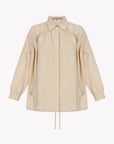 Front view of the Ailani Jacket in a natural Ecru, featuring its unique drawstring placket.