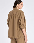 Back view of the Ailani Jacket, detailing the elegant, gathered back panel.