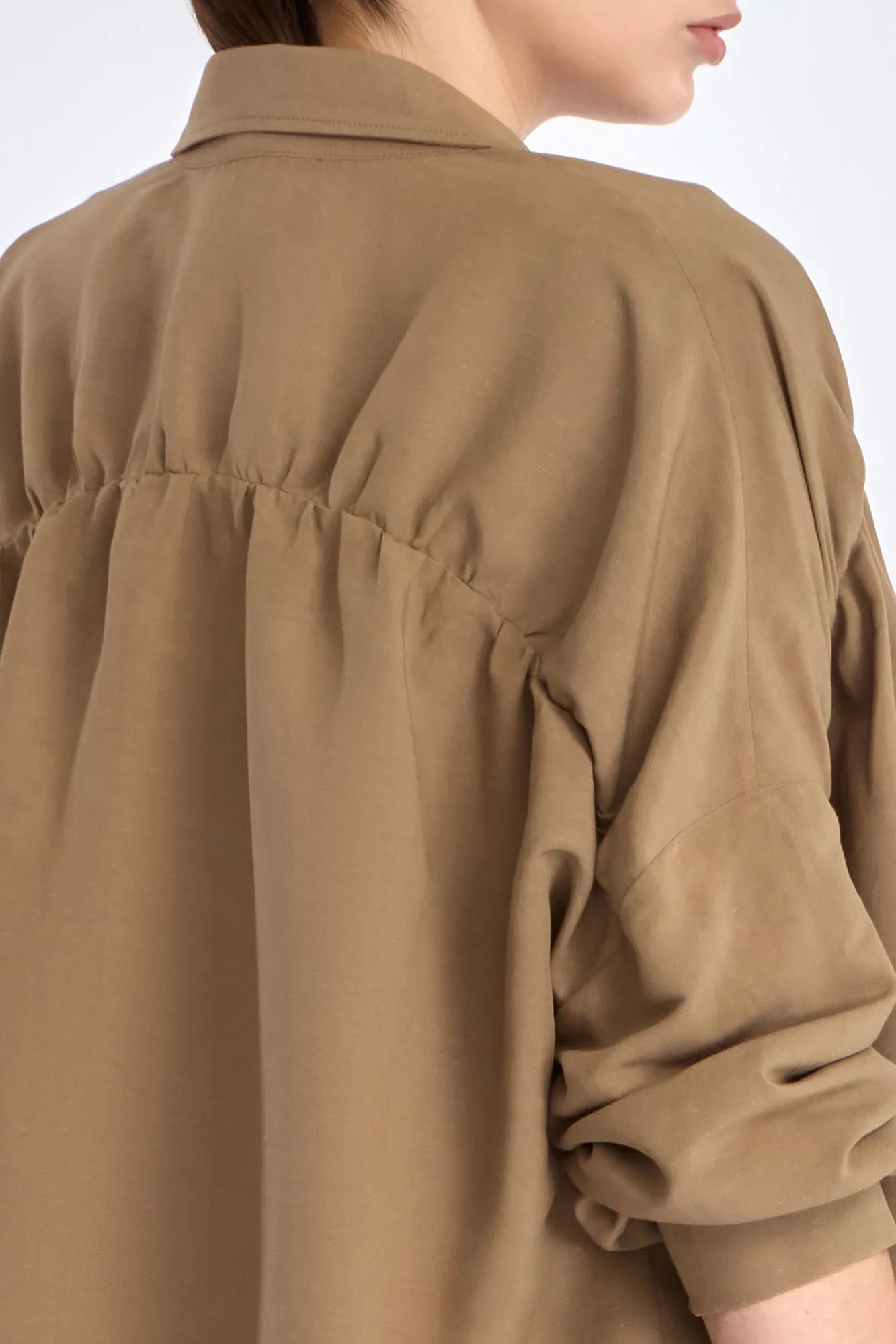 Back view of the Ailani Jacket, detailing the elegant, gathered back panel.