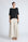 Amaya Top in Black – Round neck cotton top with short sleeves and side buckle pullers, made in Peru.