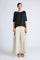 Amaya Top in Black – Round neck cotton top with short sleeves and side buckle pullers, made in Peru.
