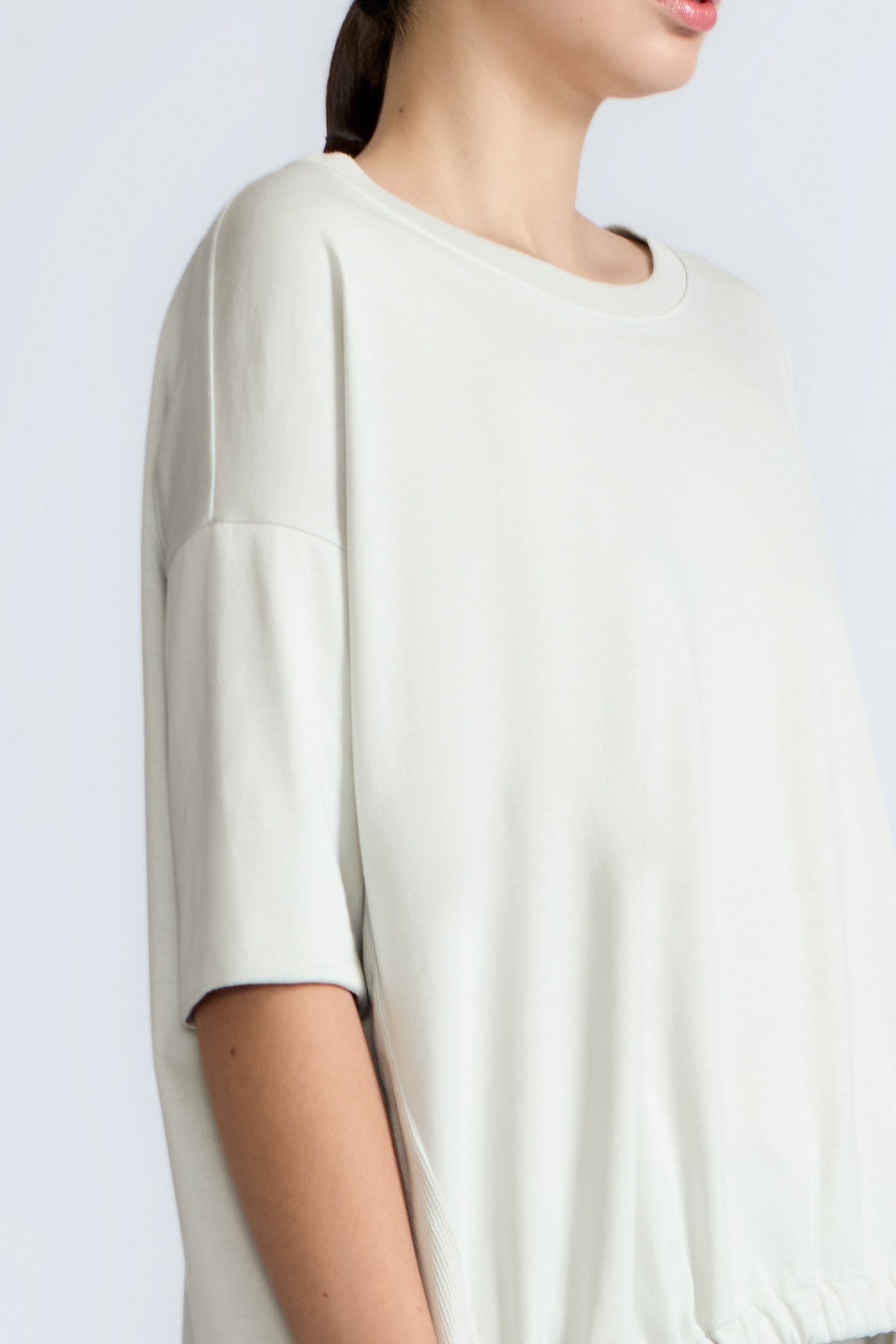 トップス AMERI / CLASSIC ROUND FORM TOP Amaya Top in Silver | Asymmetrical Cotton Top with Buckle