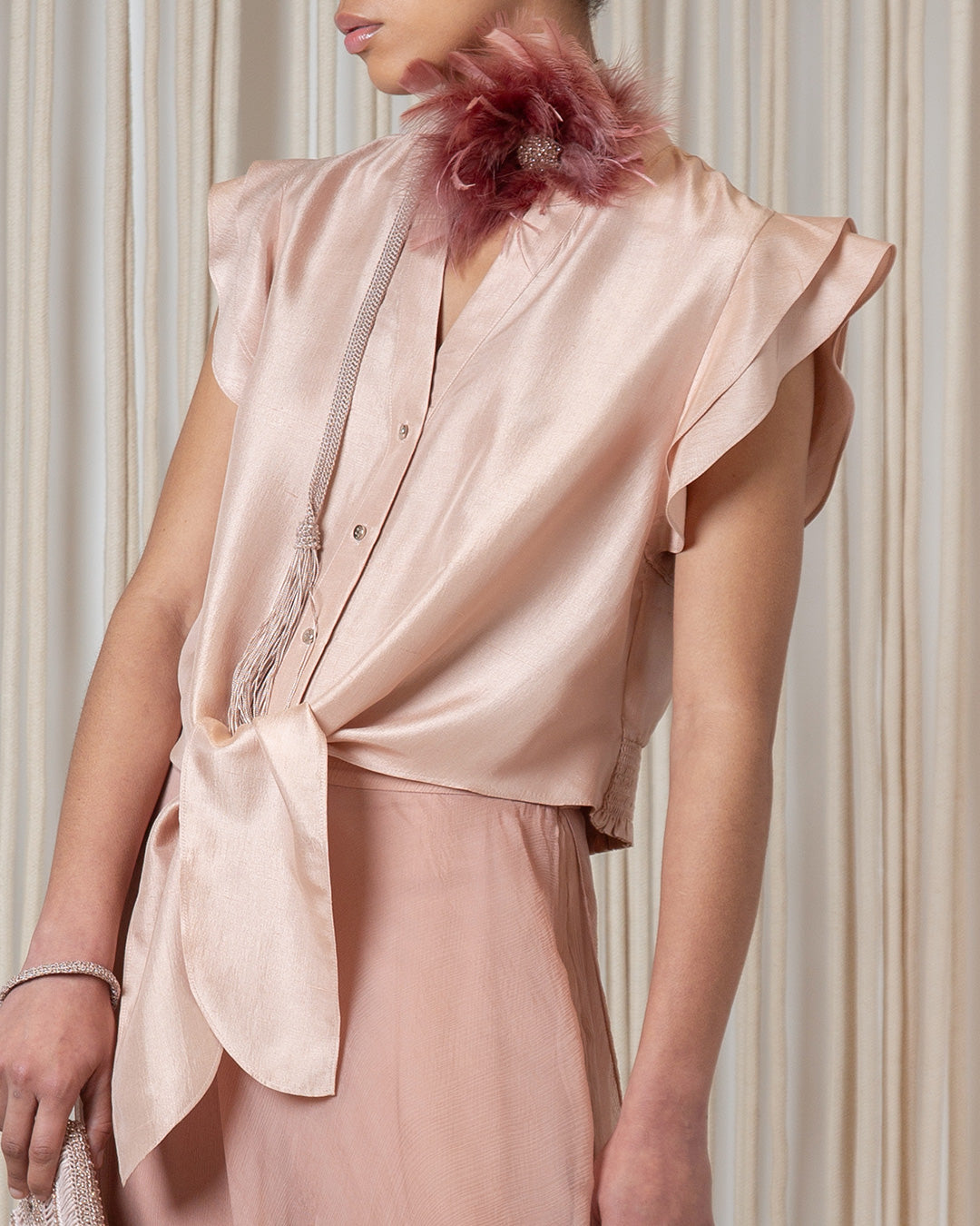 Model showcasing a luxurious natural silk garment from the Anaya Collection by Sitka Semsch.
