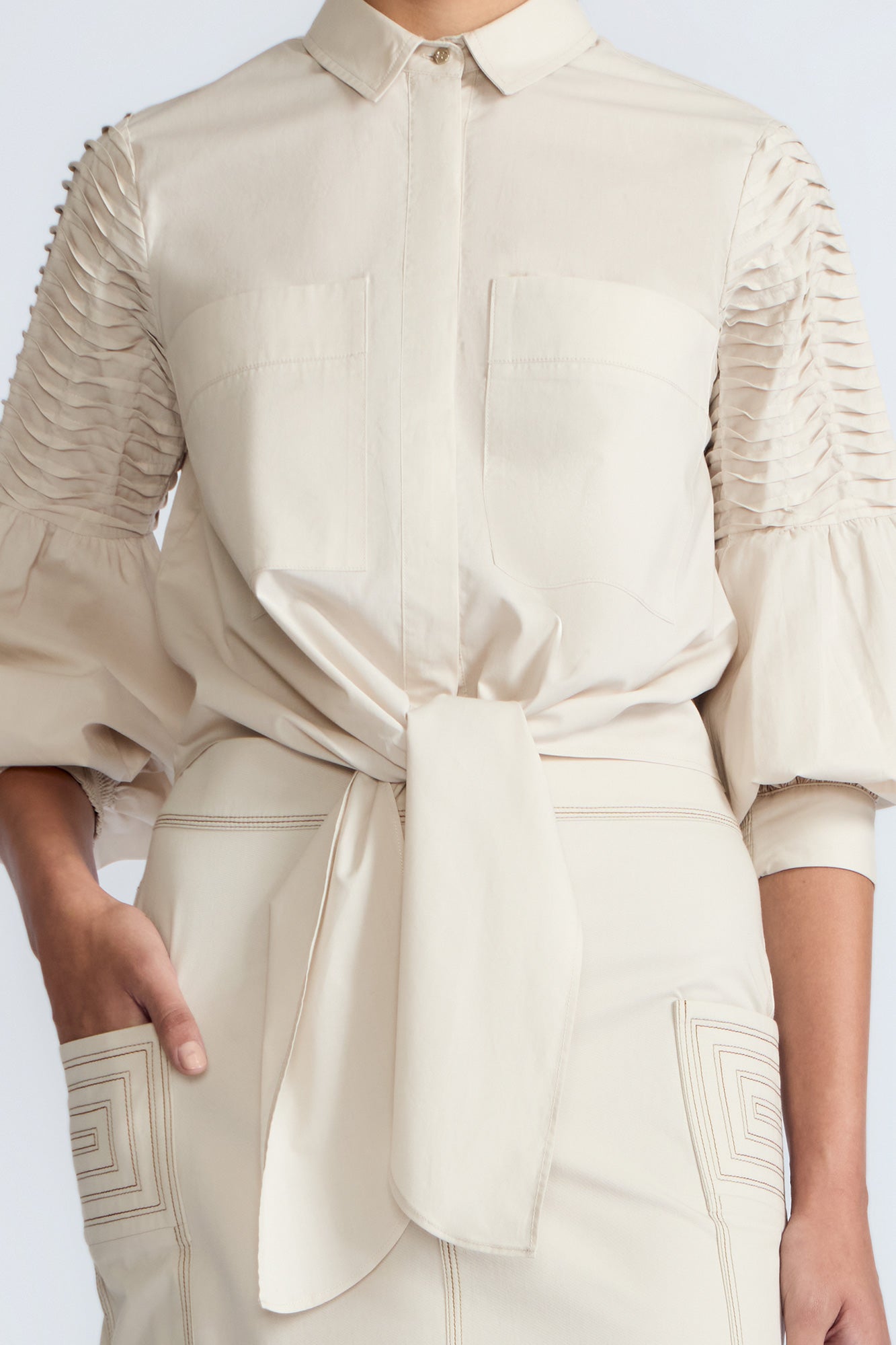 Ansley Blouse in Prestine – Lightweight cotton blouse with tie waist, balloon sleeves, and shirt collar.