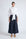 Ansley Blouse in White – Relaxed-fit cotton blouse with shirt collar, button front, and tied waist detail.