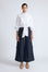 Ansley Blouse in White – Relaxed-fit cotton blouse with shirt collar, button front, and tied waist detail.