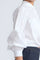 Ansley Blouse in White – Relaxed-fit cotton blouse with shirt collar, button front, and tied waist detail.