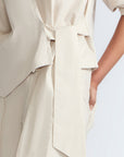 Artemisa Top in Prestine – 100% cotton top with round neckline, wrap tie at the waist, and ¾ sleeves.