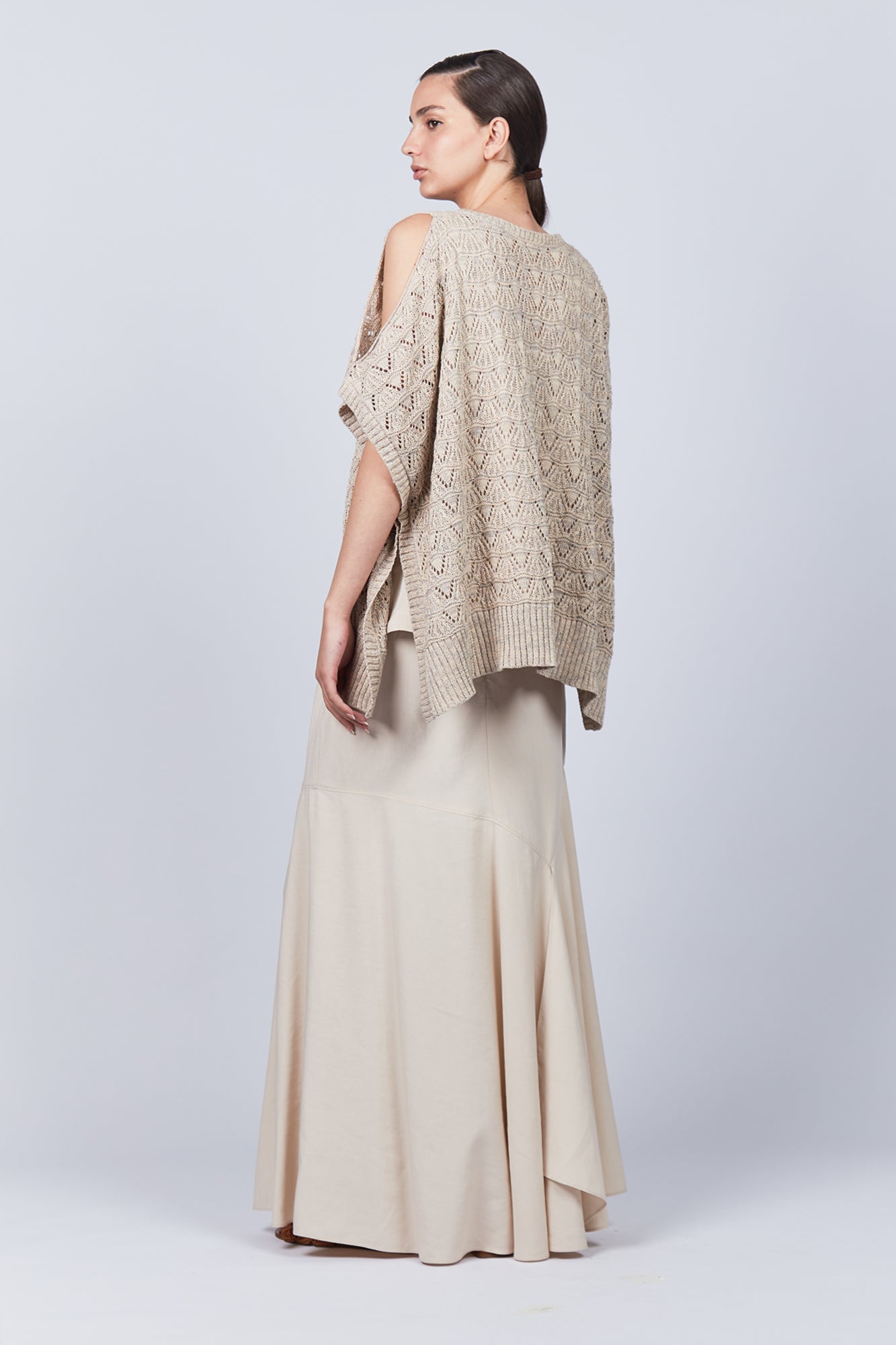 Baylee Poncho in Camel Melange with a cozy knit finish