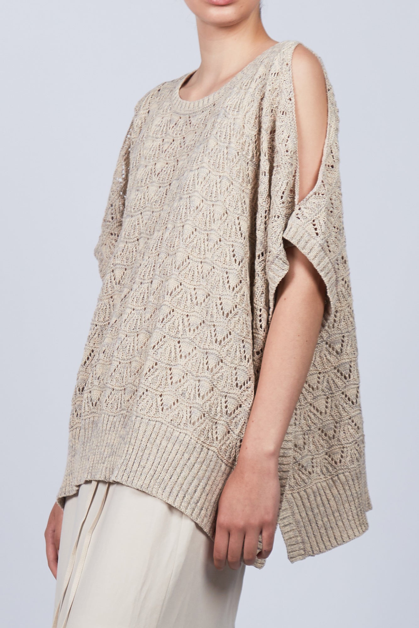 Baylee Poncho in Camel Melange with a cozy knit finish