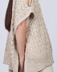 Baylee Poncho in Camel Melange with a cozy knit finish