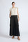 Bela Pant in Black – Cropped cotton palazzo pants with side flap pockets, elasticated waist, and contrast stitching.