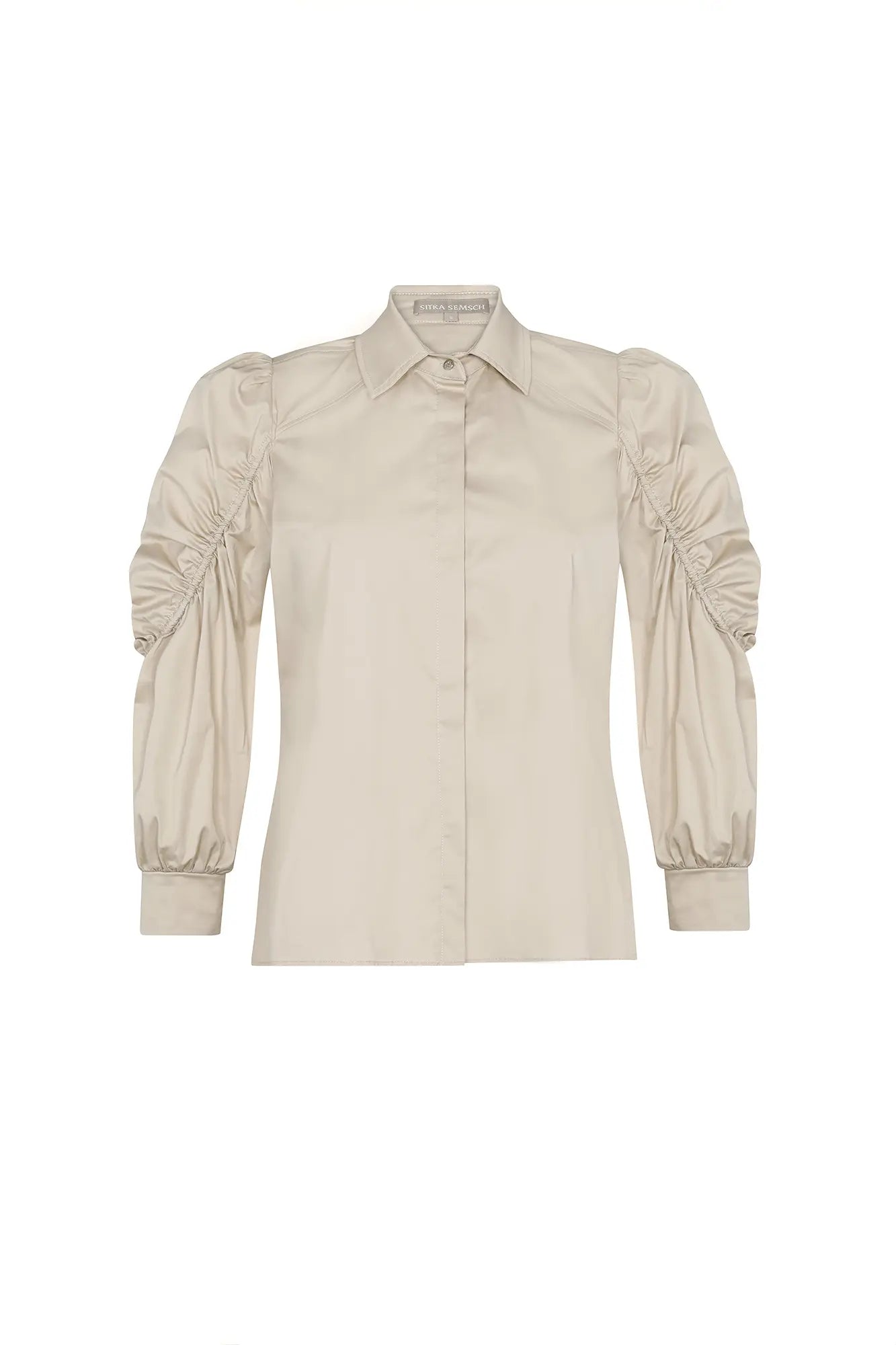 The Bimba Blouse in crisp Pristine white, featuring its sharp tailored collar.