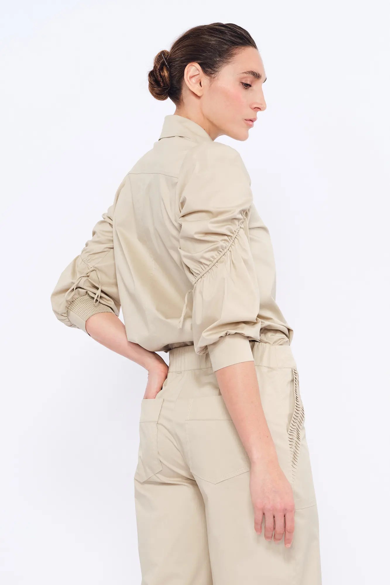 Elegant back view of the Bimba Blouse in its refined silhouette.