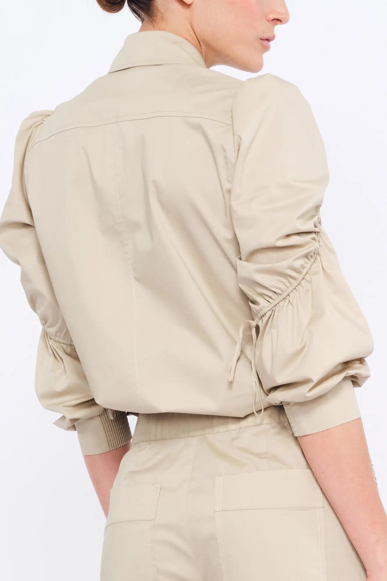 Elegant back view of the Bimba Blouse in its refined silhouette.