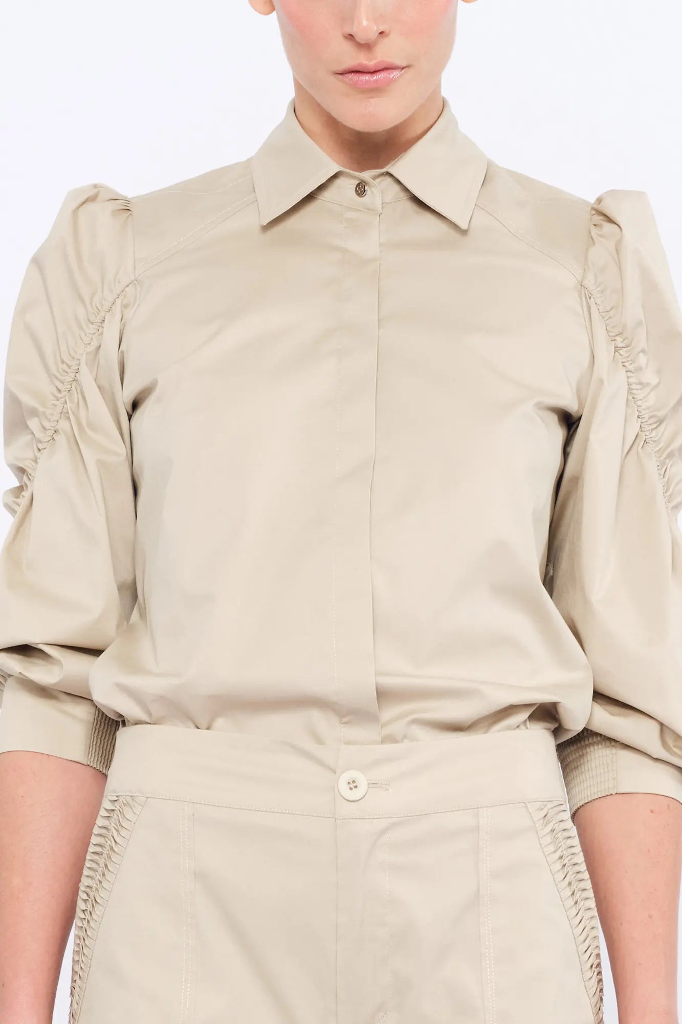 The Bimba Blouse in crisp Pristine white, featuring its sharp tailored collar.