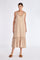 Blake Dress in Nude – Elegant long dress with delicate double straps, V-neck with ruffles, pleated skirt, and hidden side pockets.