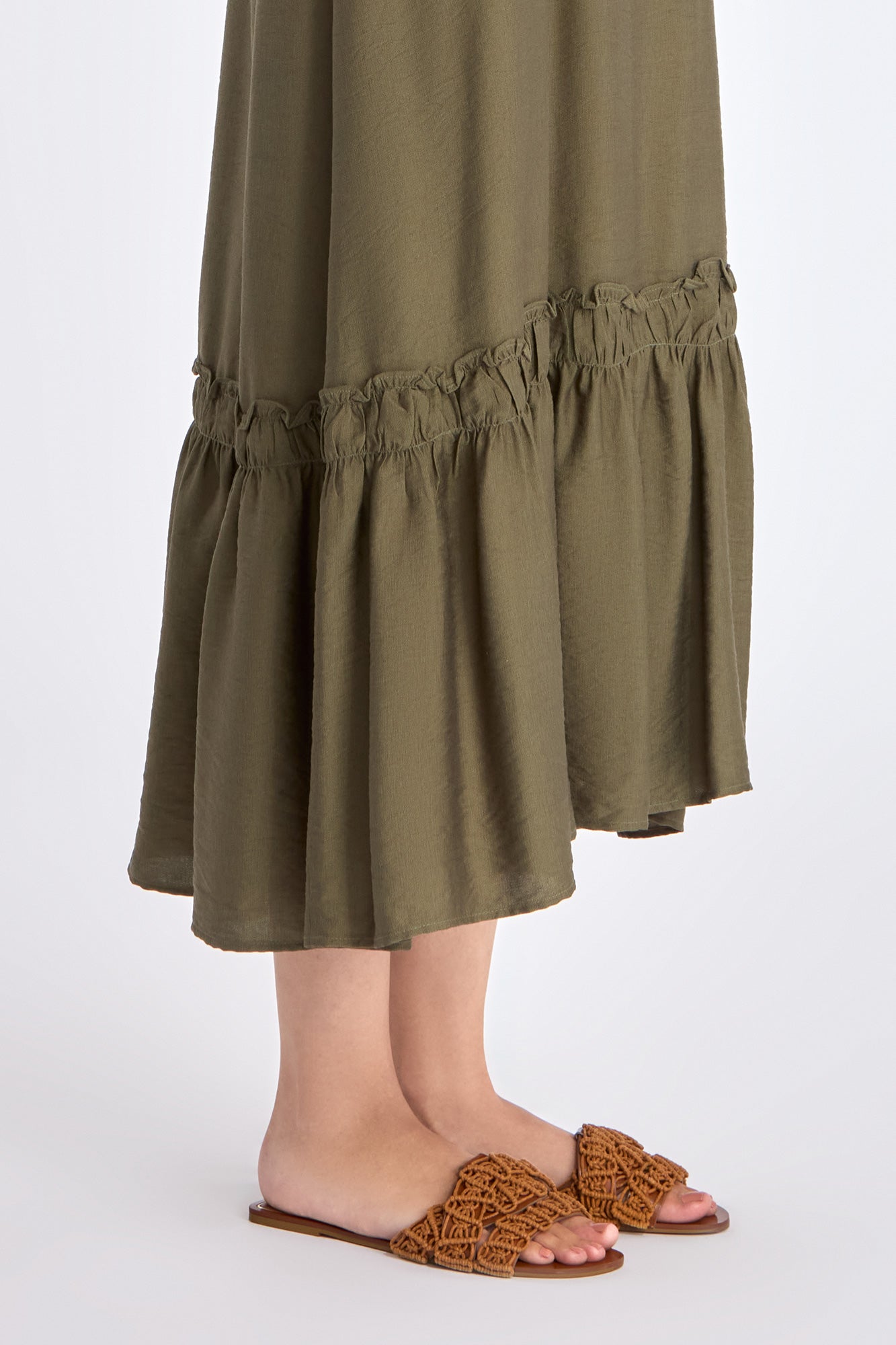 Blake Dress in Olive – Long flowy dress with double straps, soft ruffle neckline, pleated skirt, and half-elasticated back.