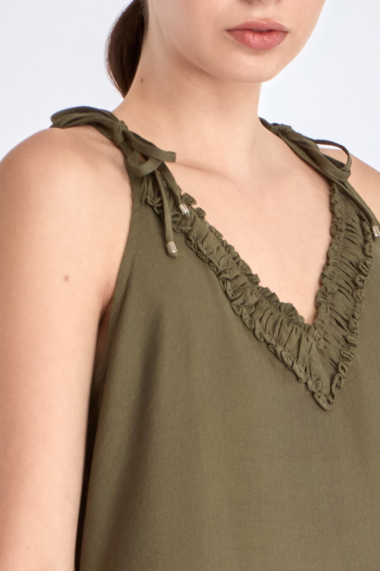 Blake Dress in Olive – Long flowy dress with double straps, soft ruffle neckline, pleated skirt, and half-elasticated back.