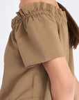 Cameron Dress in Taupe – Relaxed-fit linen blend midi dress with keyhole neckline and embroidered hem by AMEDBAM.