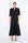 Front view of the Carlie Dress in essential black, showcasing its powerful, elegant silhouette.