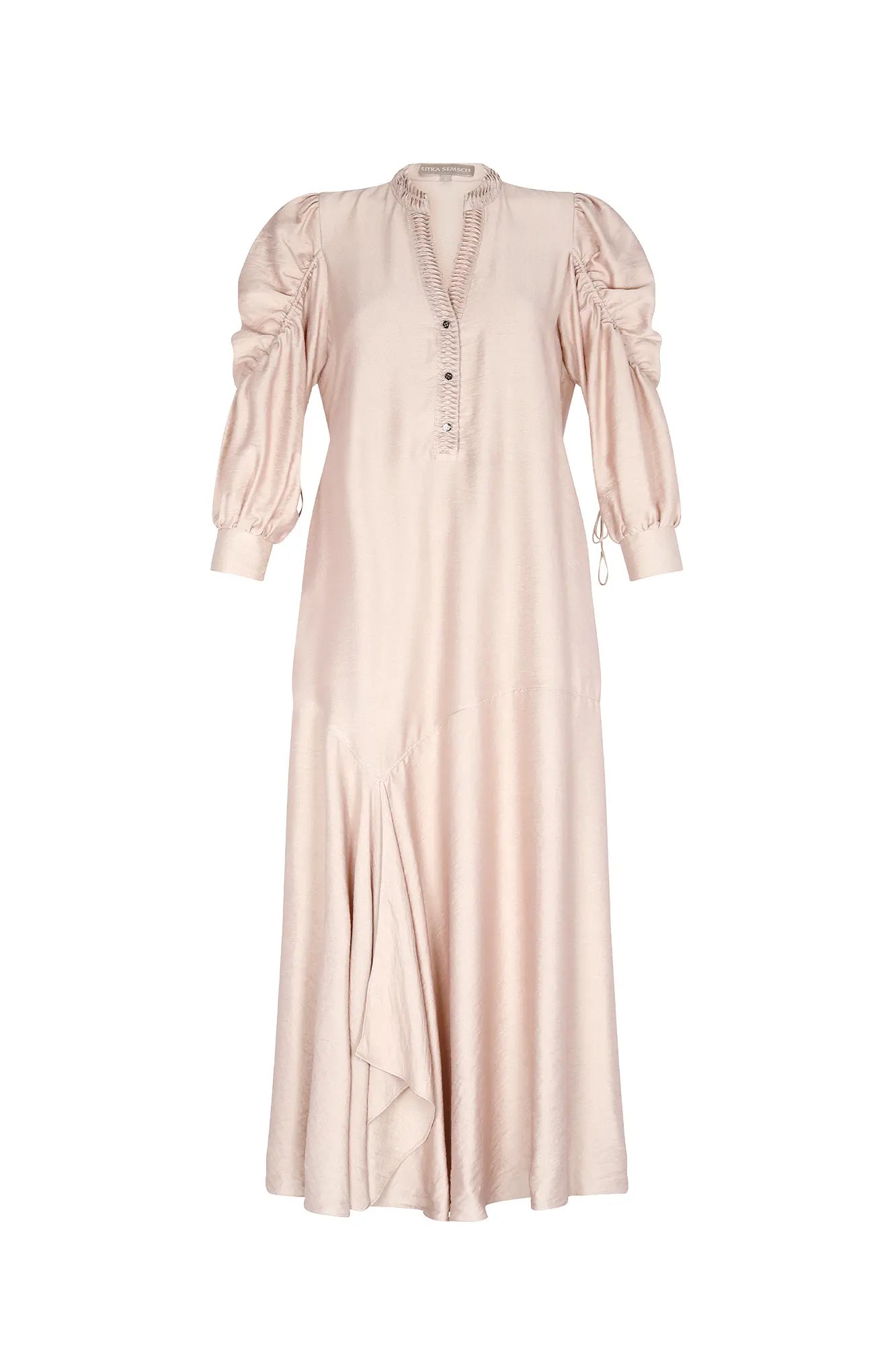 Front view of the Carlie Dress in Nude, showcasing its gathered V-neckline and asymmetrical skirt.