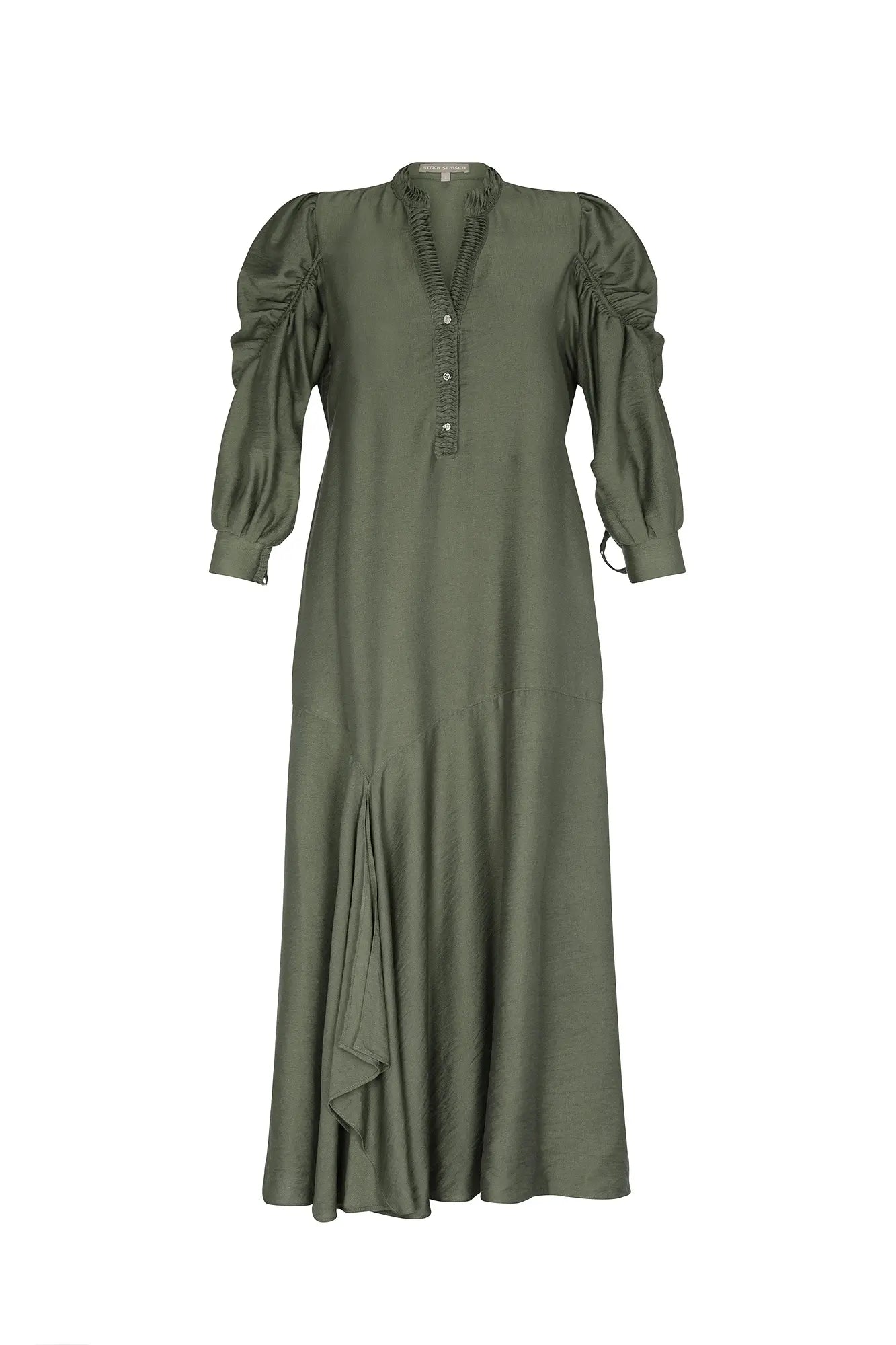 The Carlie Dress in a sophisticated Olive, featuring its soft puff sleeves and draped skirt.