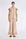 Clark Blouse in Nude – Rayon-blend shirt collar blouse with hidden placket, short ruffled sleeves, and tonal detailing.