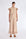 Clark Pant in Nude – Lightweight pants with diagonal patch pockets, elastic waistband, and subtle trim detail at the hem.